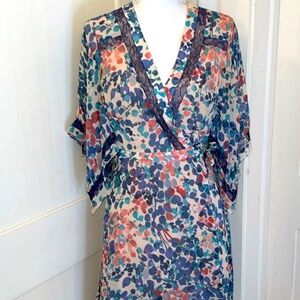 This item is a BCBGMAXAZRIA floral wrap dress Size Small